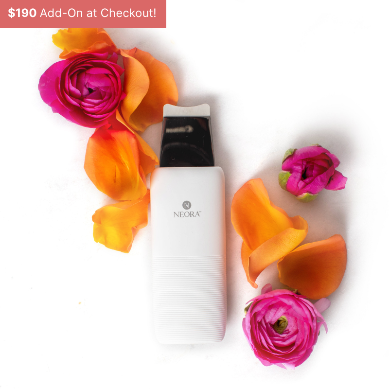 Neora’s NEW Ultrasonic Skin Renewal Facial Device amid a rose bouquet